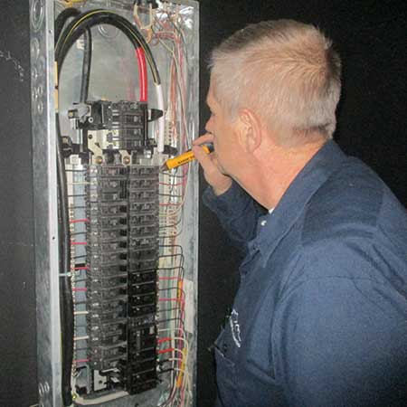 CTR Home Inspector Inspecting an Electrical System